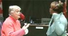 Supporters of black-only school shut down meeting