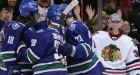 Roaring start allows Canucks to cruise to 7-3 win over Chicago