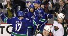 Canucks rally to beat Wild