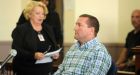 Ex-trooper gets 1 year for theft from dying motorist